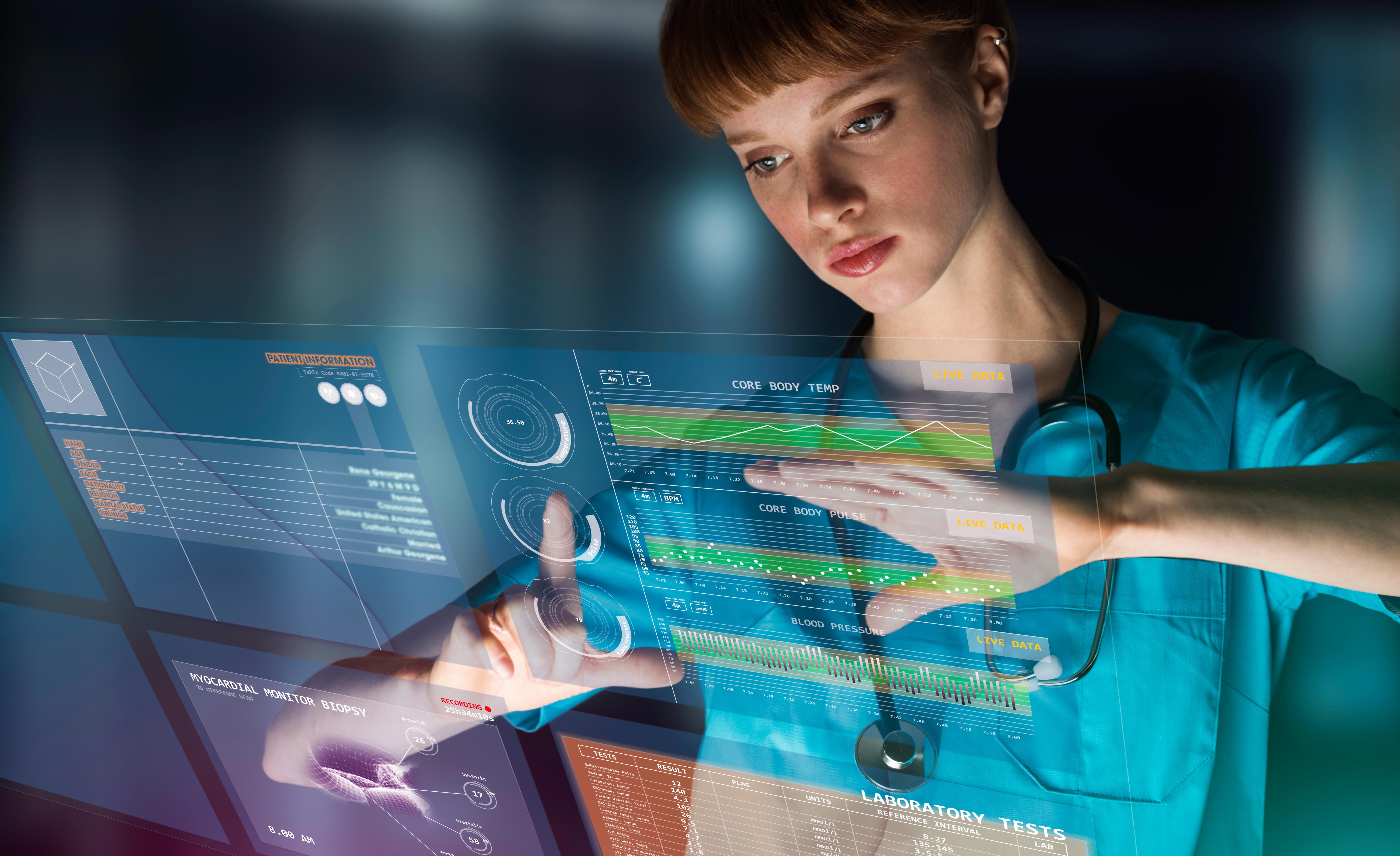 Woman expanding a holographic data image