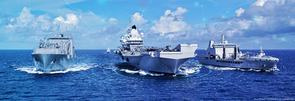 Multiple aircraft carriers and battleships are seen on the ocean.